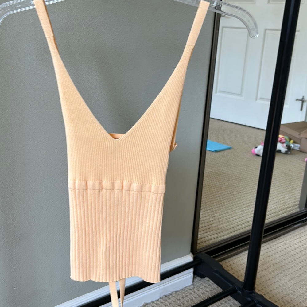 Sara tangerine top